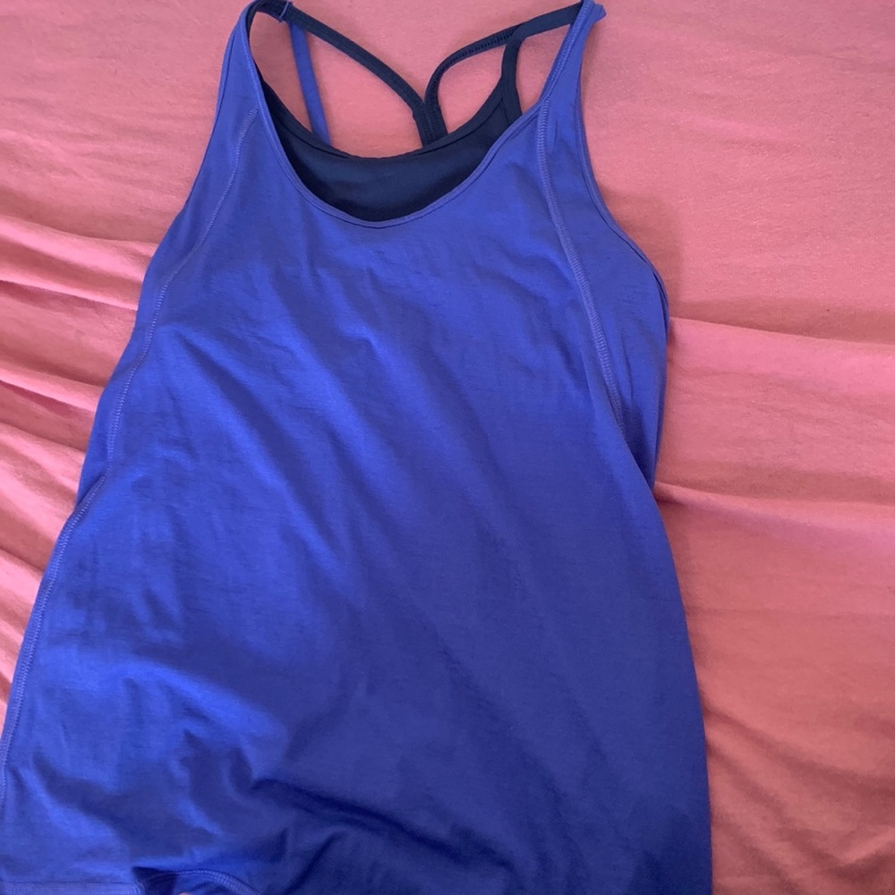 Blue Tanktop with built in bra. Size Medium. Color Blue
